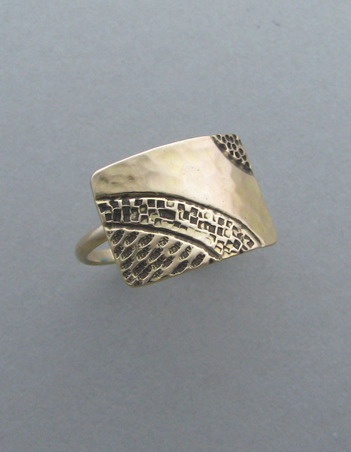 gold ring cocktail ring stamped shield