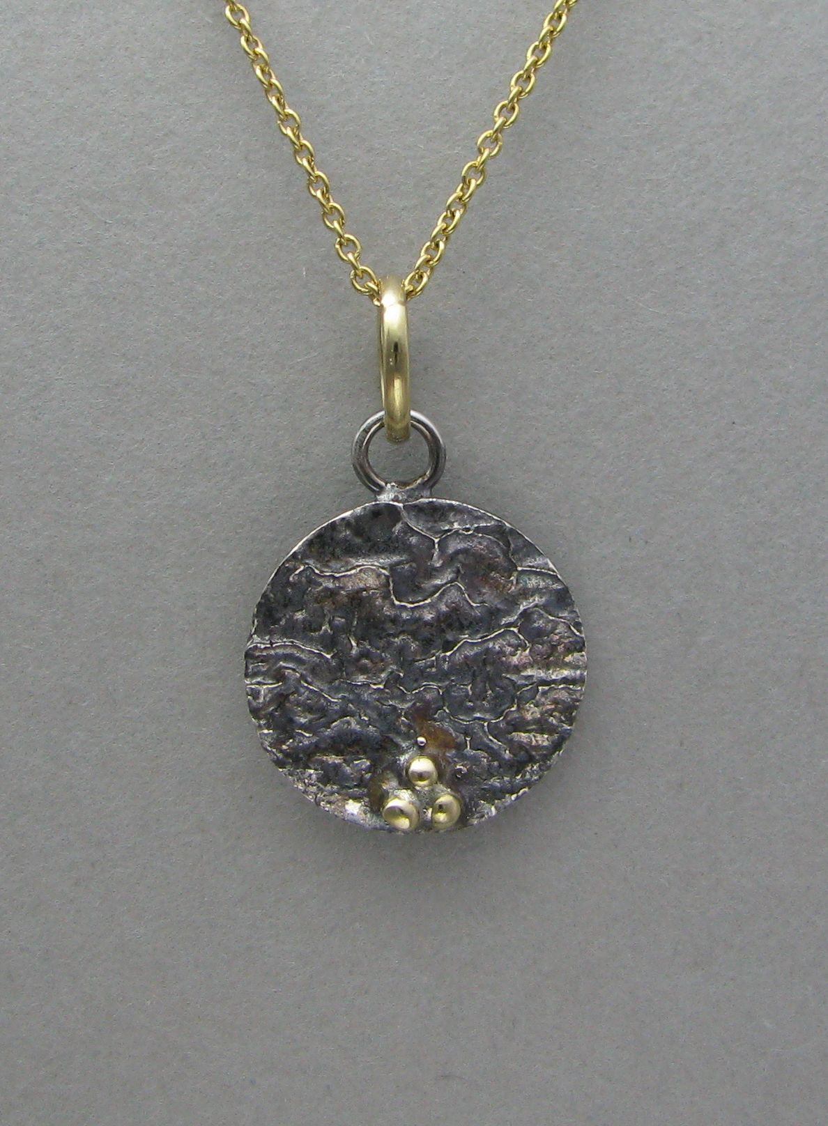 silver oxidized pendant necklace with gold