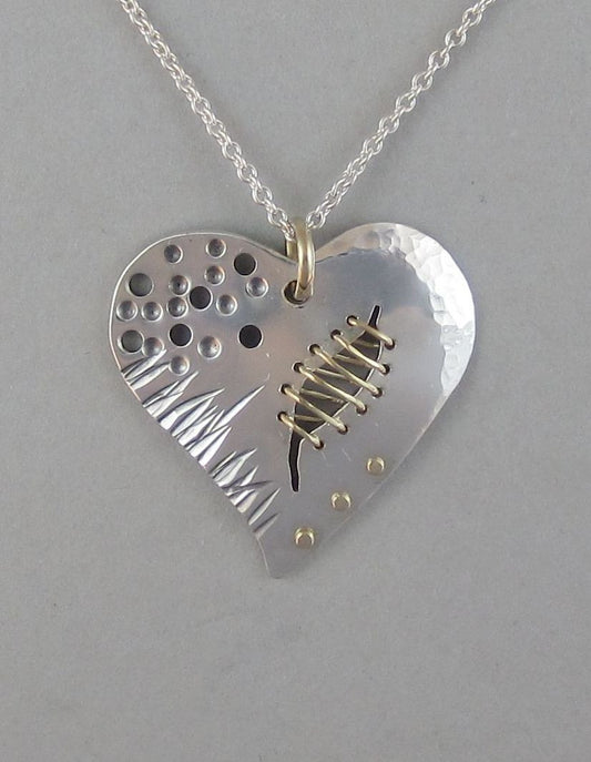 sterling silver heart pendant necklace with gold broken heart