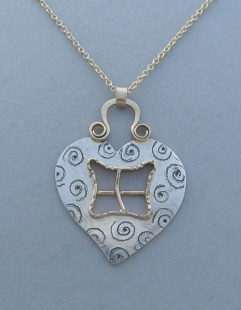 sterling silver heart pendant necklace window to my soul with gold 